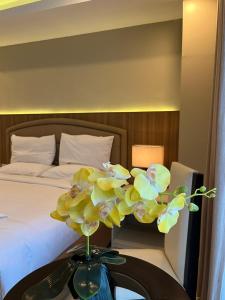 Iloilo Gateway Hotel and Suites客房内的一张或多张床位