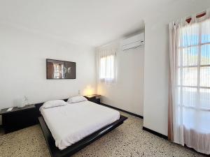 Posteľ alebo postele v izbe v ubytovaní PENI 168A - Belle maison avec piscine + 16 fotografií
