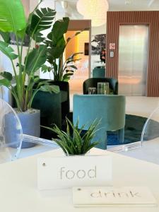 Reštaurácia alebo iné gastronomické zariadenie v ubytovaní Perla Verde Hotel