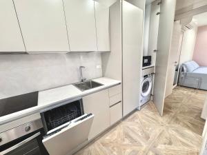 Kuchyň nebo kuchyňský kout v ubytování Hotel Astigiana & Appartamenti