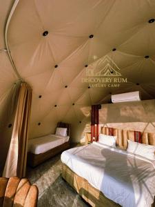 Postel nebo postele na pokoji v ubytování Ayla Rum Luxury Camp