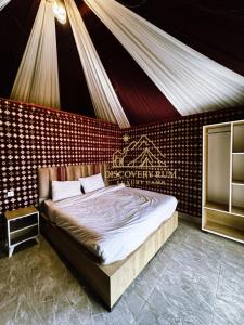 Postel nebo postele na pokoji v ubytování Ayla Rum Luxury Camp + 37 fotografií