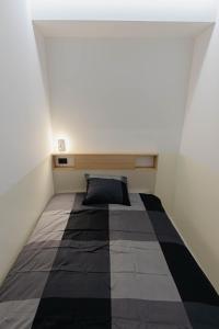 a bedroom with a bed in a room at ALPEART GOZD MARTULJEK HOLIDAY unit in Kranjska Gora