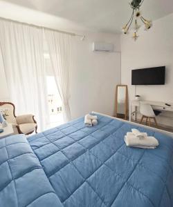 Postel nebo postele na pokoji v ubytování A Casa dei Miei