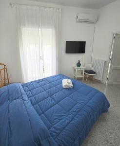 Postel nebo postele na pokoji v ubytování A Casa dei Miei