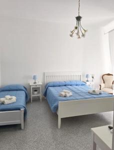 Postel nebo postele na pokoji v ubytování A Casa dei Miei