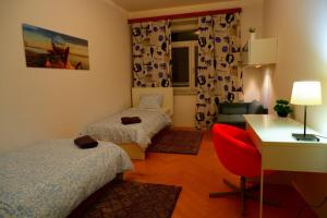Giường trong phòng chung tại ROOMS Udolni - Červený kostel