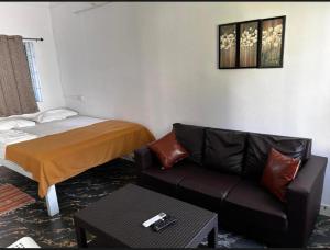 Raj Andar Guest House客房内的一张或多张床位