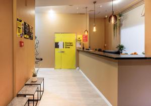 Kuchyň nebo kuchyňský kout v ubytování Design Hostel One