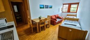Area soggiorno di Hotel Celjska Koca