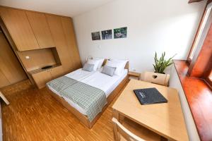 Letto o letti in una camera di Hotel Celjska Koca