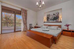 Postel nebo postele na pokoji v ubytování Coral Tree Luxury Villa + 18 fotografií