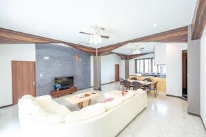 TV o dispositivi per l'intrattenimento presso Resort in青の洞窟