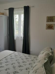 Postel nebo postele na pokoji v ubytování Cortile Fiorito B&B