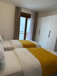 Letto o letti in una camera di Treva Appartaments