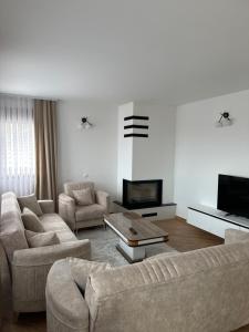 TV o dispositivi per l'intrattenimento presso Treva Appartaments