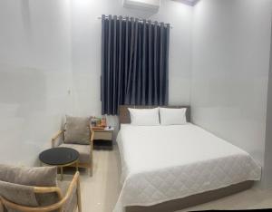 Afbeelding uit fotogalerij van Hoàng Gia 2 Hotel in Ấp An Phú +15 foto's