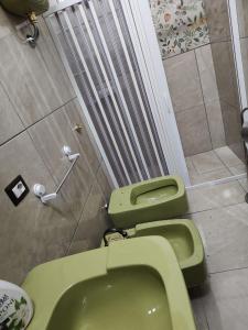Koupelna v ubytování GeMy Apartment + 24 fotografií