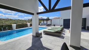 Swimmingpoolen hos eller tæt på Spectacular 4 bed villa at El Valle Golf Resort