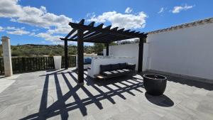 En balkon eller terrasse på Spectacular 4 bed villa at El Valle Golf Resort + 45 billeder