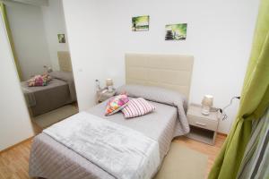 Postel nebo postele na pokoji v ubytování Al Bastione Relais Suite & Rooms