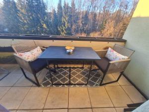 A balcony or terrace at HomeW4 - Rosen Apartment