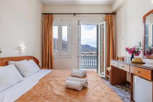 Afbeelding uit fotogalerij van Lemonis Rooms in Skopelos Town