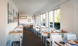 Um restaurante ou outro lugar para comer em Hotel Suisse