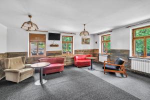 Posezení v ubytování Apartmán pod Mariánskou horou