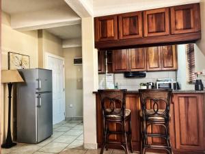 Kuchyň nebo kuchyňský kout v ubytování Timbos Suites + 7 fotografií