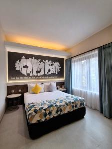 Katil atau katil-katil dalam bilik di Hotel Sriti Magelang