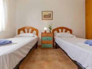 Posteľ alebo postele v izbe v ubytovaní Holiday Home Zona Estival-2 by Interhome