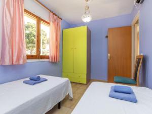 Postel nebo postele na pokoji v ubytování Apartment Del Lago by Interhome