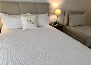 A bed or beds in a room at Aegean Blue Horizon