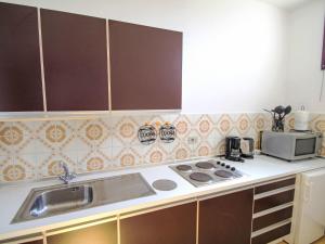 A kitchen or kitchenette at Apartment Euroville-9 by Interhome Még 22 kép