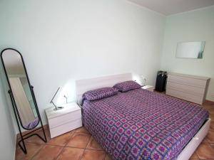 A bed or beds in a room at Apartment Euroville-9 by Interhome