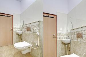 班加罗尔Hotel O Karanji Comforts的带卫生间和淋浴的浴室