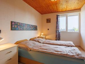 Posteľ alebo postele v izbe v ubytovaní Apartment Gagarin 1 - MAF136 by Interhome + 12 fotografií