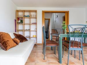 a living room with a couch and a table at Holiday Home Zona Estival-3 by Interhome in Salou