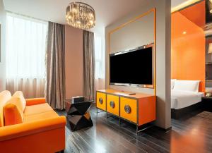 Televisyen dan/atau pusat hiburan di Crystal Orange Hotel Shanghai Caohejing Yishan Road