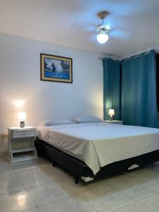 Postel nebo postele na pokoji v ubytování Departamento 4 habitaciones 12 personas vista al mar 8vo piso Playa Almendro + 37 fotografií