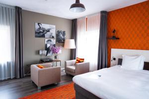 Postel nebo postele na pokoji v ubytování Hotel de Wereld