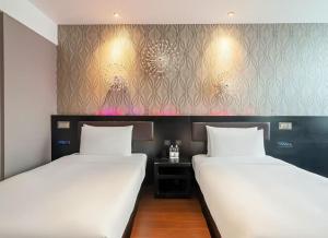 Katil atau katil-katil dalam bilik di Crystal Orange Hotel Shanghai Caohejing Yishan Road
