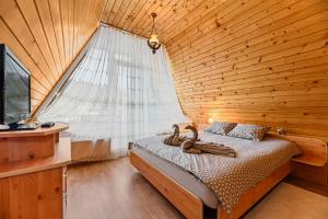 Postel nebo postele na pokoji v ubytování FLH - Emprin House