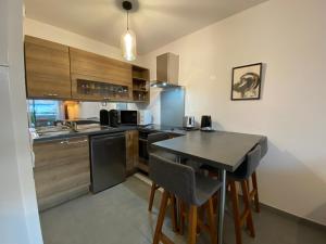 Kuchyň nebo kuchyňský kout v ubytování Appartement moderne proche centre Capbreton