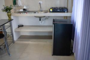 Kuchyň nebo kuchyňský kout v ubytování Apartamentos Villacentro + 1 fotografie