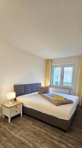 Postel nebo postele na pokoji v ubytování Appartementhaus Westerloog 04-Balkon