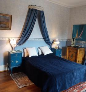 Ένα ή περισσότερα κρεβάτια σε δωμάτιο στο Le coq en pâte