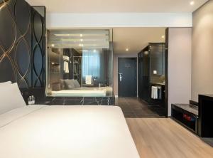 Katil atau katil-katil dalam bilik di Crystal Orange Hotel Shanghai Caohejing Yishan Road