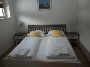 A bed or beds in a room at Haus Royal